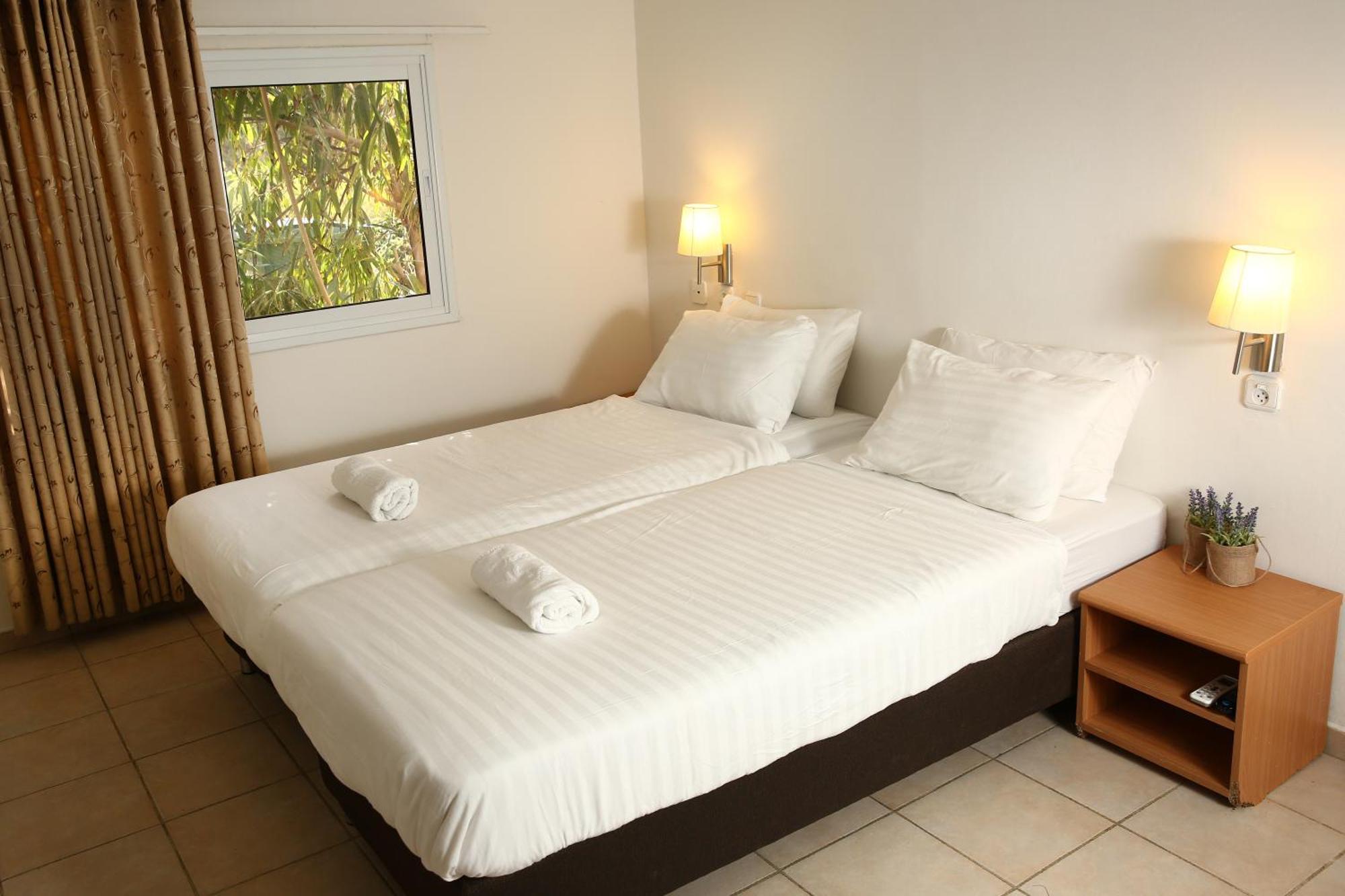Eilot Kibbutz Country Lodging Эйлат Номер фото